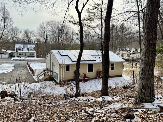 view of snow covered property