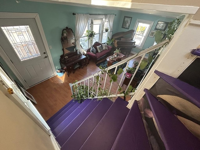 stairway featuring hardwood / wood-style flooring