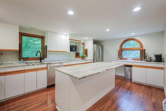 161 N Worcester St, Norton, MA 02766 - kitchen featuring stainless steel appliances, white cabinetry, dark wood-type flooring, and recessed lighting