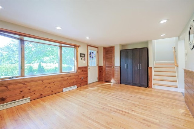 161 N Worcester St, Norton, MA 02766 - spare room featuring a wainscoted wall, light wood-type flooring, stairs, recessed lighting, and wooden walls