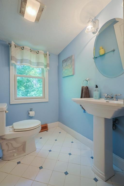 161 N Worcester St, Norton, MA 02766 - bathroom featuring toilet and tile patterned flooring