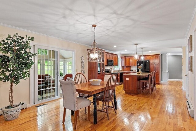 86 S Cross Rd, Haverhill, MA 01835 - dining area featuring light wood finished floors, a chandelier, ornamental molding, recessed lighting, and baseboard heating