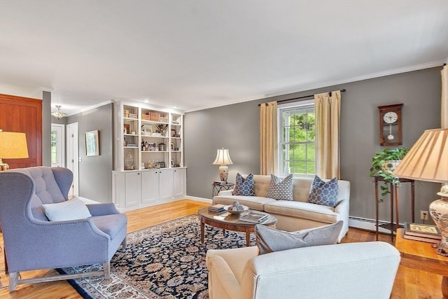 86 S Cross Rd, Haverhill, MA 01835 - living room featuring light wood-style flooring, ornamental molding, baseboard heating, and baseboards