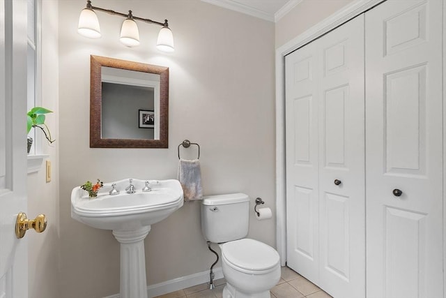 86 S Cross Rd, Haverhill, MA 01835 - bathroom featuring a closet, toilet, tile patterned floors, ornamental molding, and baseboards