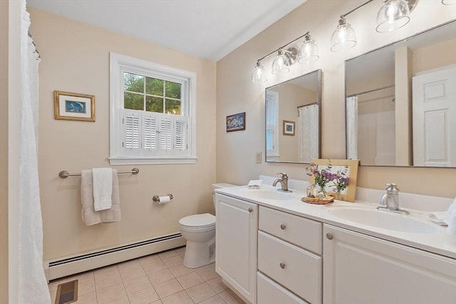 86 S Cross Rd, Haverhill, MA 01835 - full bathroom featuring baseboard heating, double vanity, tile patterned flooring, and toilet