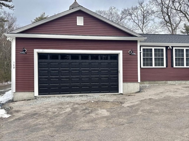 garage with driveway