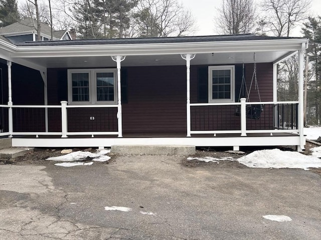 exterior space featuring covered porch