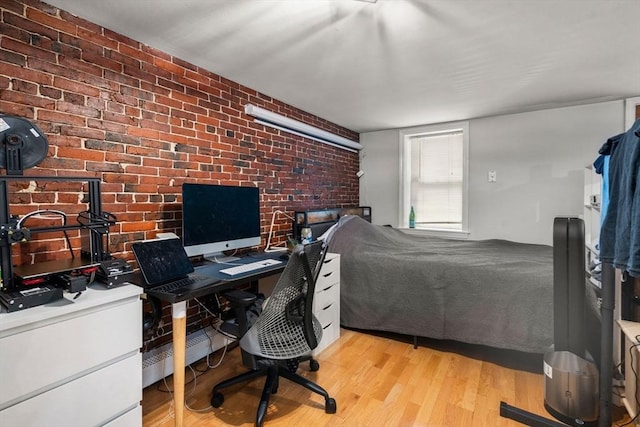 267 Lexington St Unit 1, Boston, MA 02128 - office area featuring brick wall and light wood-style flooring