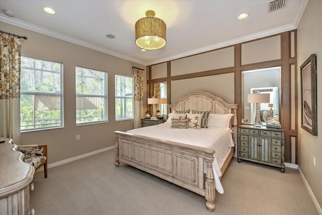 bedroom with light carpet and crown molding