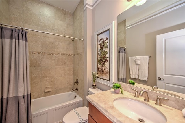 full bathroom with vanity, shower / bath combo with shower curtain, and toilet