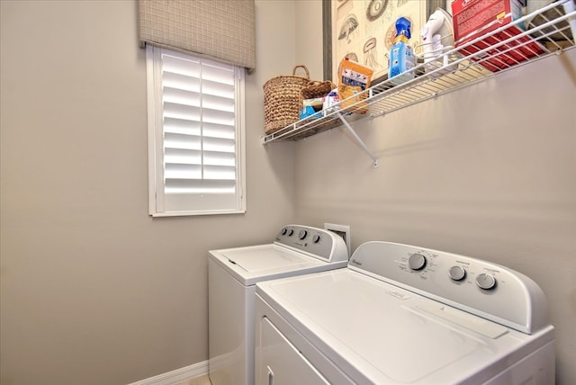 washroom with separate washer and dryer