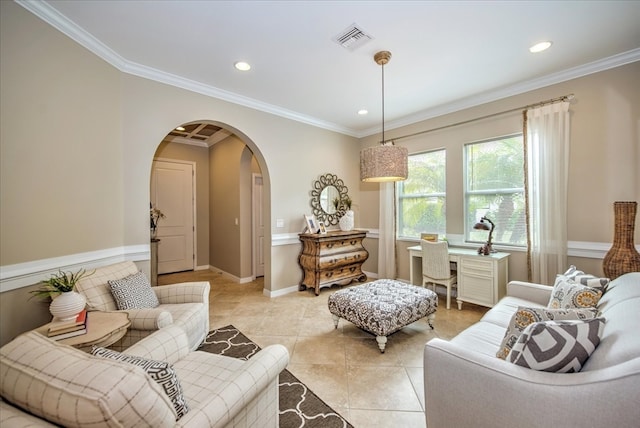 living area featuring light tile patterned floors and crown molding