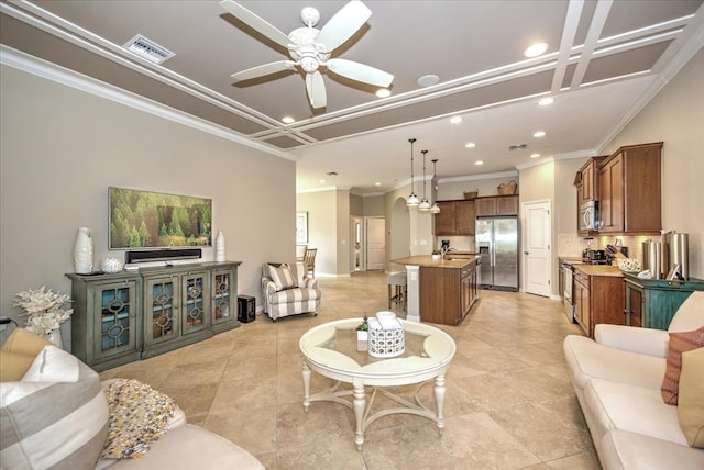 living room featuring ornamental molding, coffered ceiling, light tile patterned floors, and ceiling fan