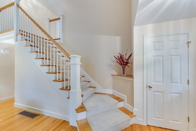 20 Crestview Cir, Barnstable, MA 02632 - stairway with wood finished floors and baseboards