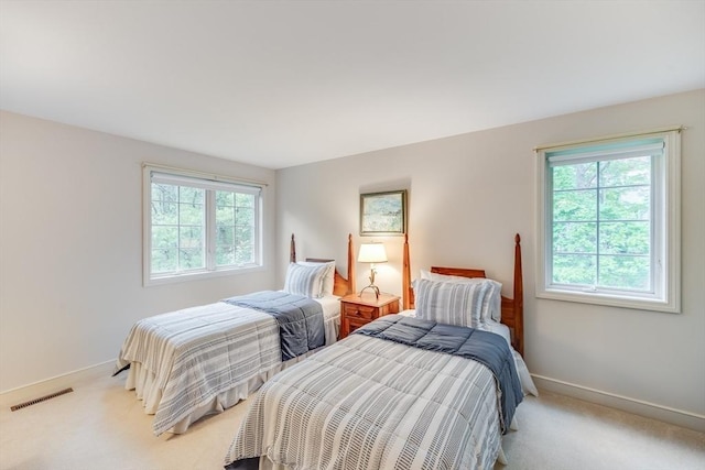20 Crestview Cir, Barnstable, MA 02632 - bedroom with light carpet and baseboards