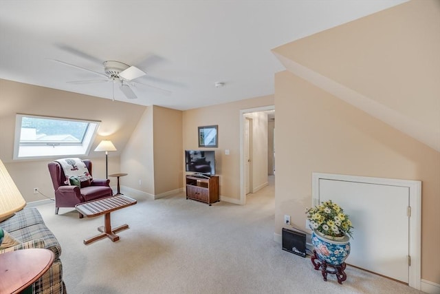 20 Crestview Cir, Barnstable, MA 02632 - living area featuring a skylight, ceiling fan, light colored carpet, vaulted ceiling, and baseboards