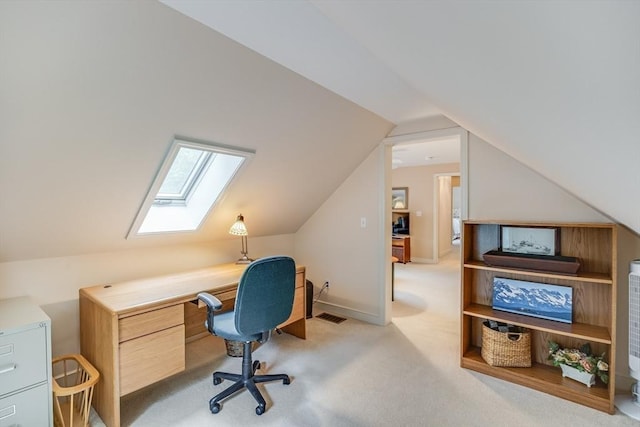 20 Crestview Cir, Barnstable, MA 02632 - home office with a skylight, vaulted ceiling, and light colored carpet