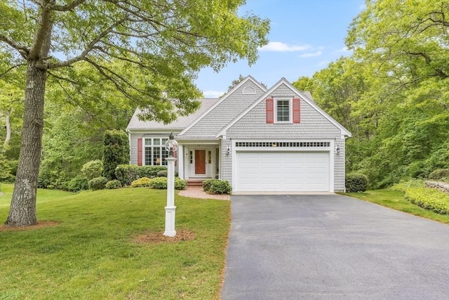 20 Crestview Cir, Barnstable, MA 02632 - view of front of property with asphalt driveway, a front lawn, and a garage