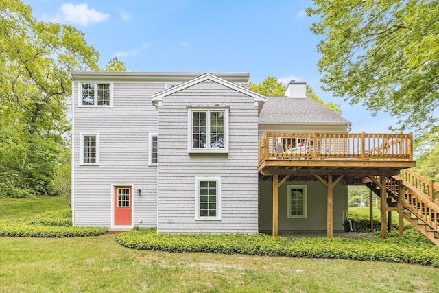 20 Crestview Cir, Barnstable, MA 02632 - rear view of house with a wooden deck, a yard, stairway, and a chimney