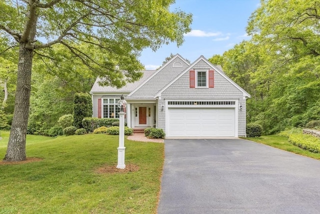 20 Crestview Cir, Barnstable, MA 02632 - view of front facade with driveway, a front lawn, and a garage