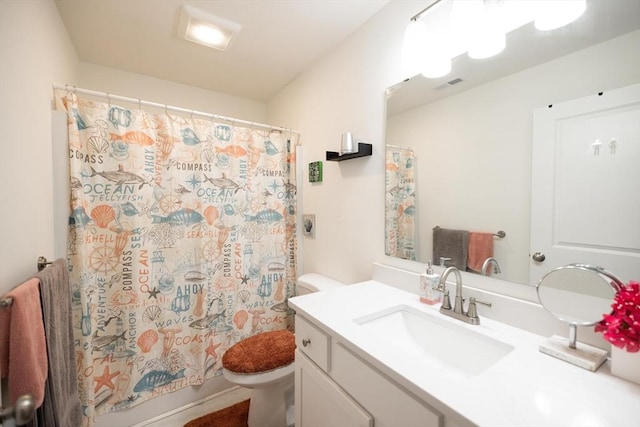 full bathroom with shower / tub combo, vanity, and toilet