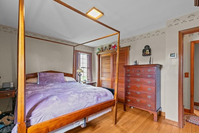 1 Pine Ln, Warren, RI 02885 - bedroom featuring light wood-style flooring, baseboards, and a closet