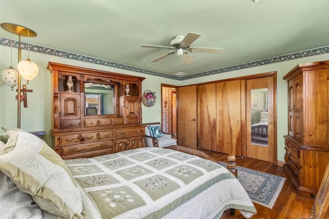 bedroom featuring a ceiling fan and wood finished floors