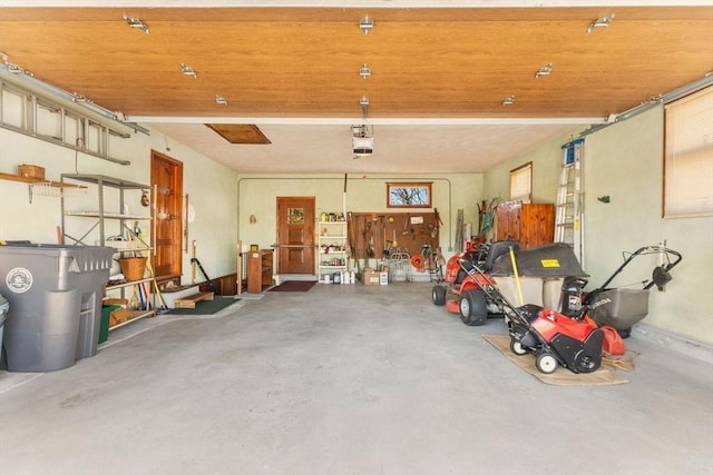 garage featuring a garage door opener