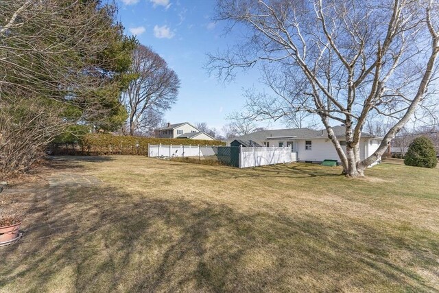 view of yard featuring fence