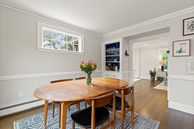 61 Howitt Rd, Boston, MA 02132 - dining area with a baseboard heating unit, dark wood-style floors, crown molding, and baseboards