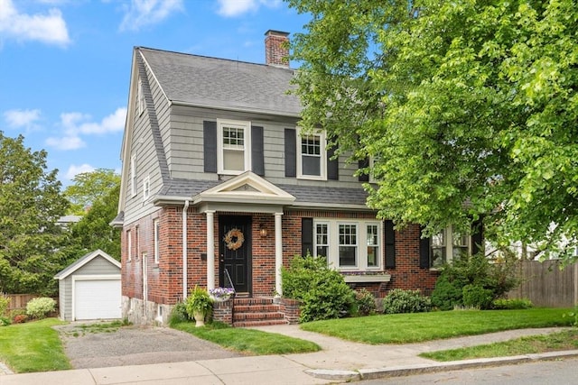 61 Howitt Rd, Boston, MA 02132 - view of front of house featuring an outbuilding, a shingled roof, a detached garage, and a chimney