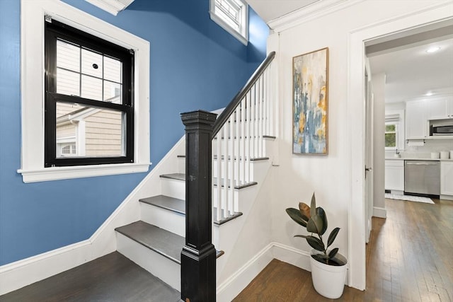 61 Howitt Rd, Boston, MA 02132 - staircase featuring wood finished floors and baseboards