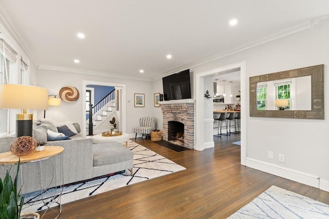 61 Howitt Rd, Boston, MA 02132 - living room featuring stairs, wood finished floors, crown molding, recessed lighting, and a fireplace
