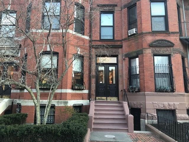 342 Commonwealth Ave Unit 2, Boston, MA 02115 - doorway to property with french doors, brick siding, and cooling unit