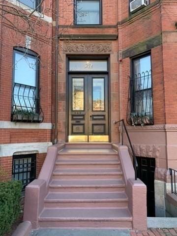 342 Commonwealth Ave Unit 2, Boston, MA 02115 - view of exterior entry featuring french doors and brick siding