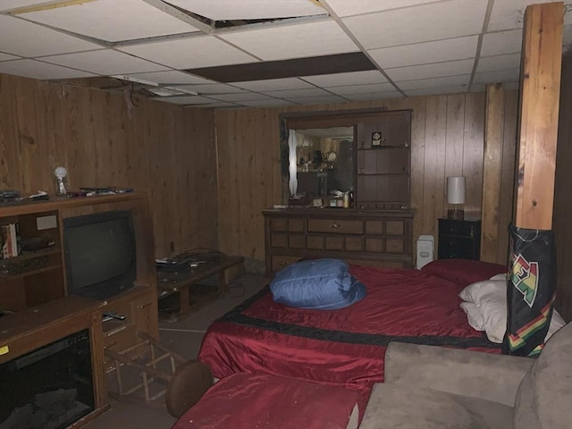 389 Breakneck Rd, Southbridge, MA 01550 - bedroom featuring wooden walls and a paneled ceiling