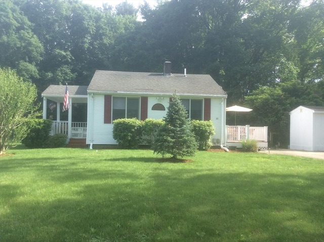 22 Smith St, Norton, MA 02766 - bungalow featuring a front lawn and covered porch