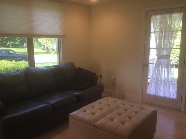 22 Smith St, Norton, MA 02766 - living area with wood finished floors and baseboards