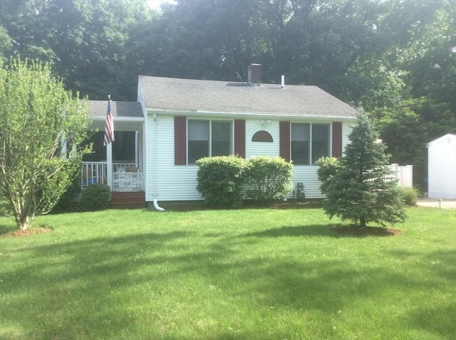 22 Smith St, Norton, MA 02766 - view of front of property featuring a front yard and a chimney