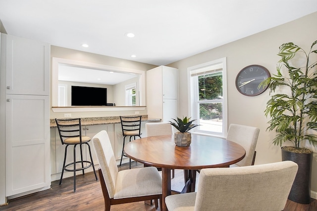 dining area with wood-type flooring