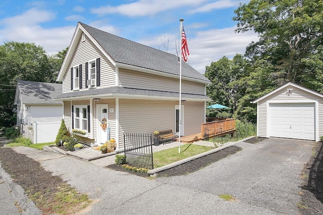 view of home's exterior featuring an outbuilding and a garage