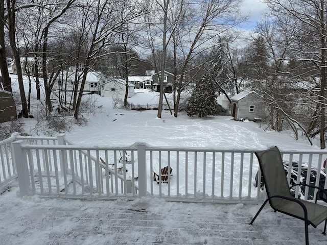 view of snow covered deck