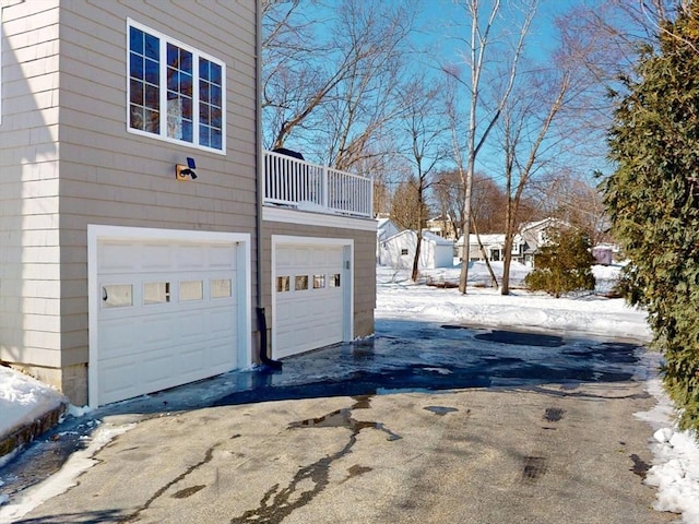 garage featuring driveway