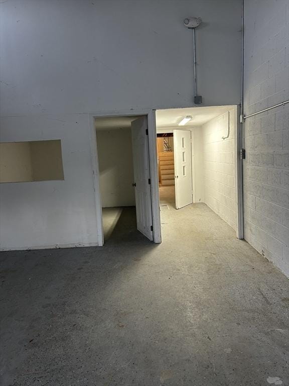 garage with concrete block wall