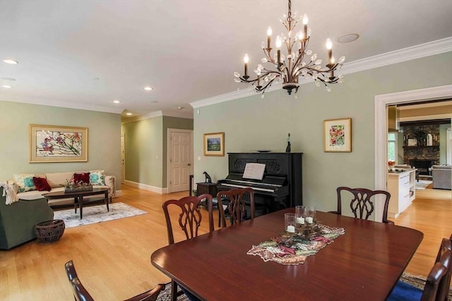 32 Twitchell St, Wellesley, MA 02482 - dining area with ornamental molding, light wood finished floors, a chandelier, recessed lighting, and baseboards