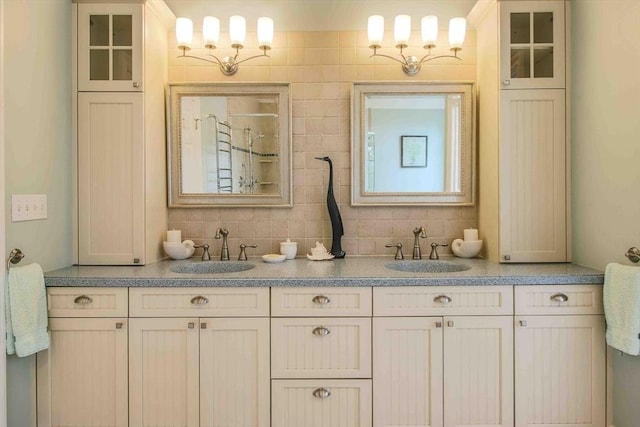 32 Twitchell St, Wellesley, MA 02482 - full bathroom with double vanity, a shower, and tasteful backsplash