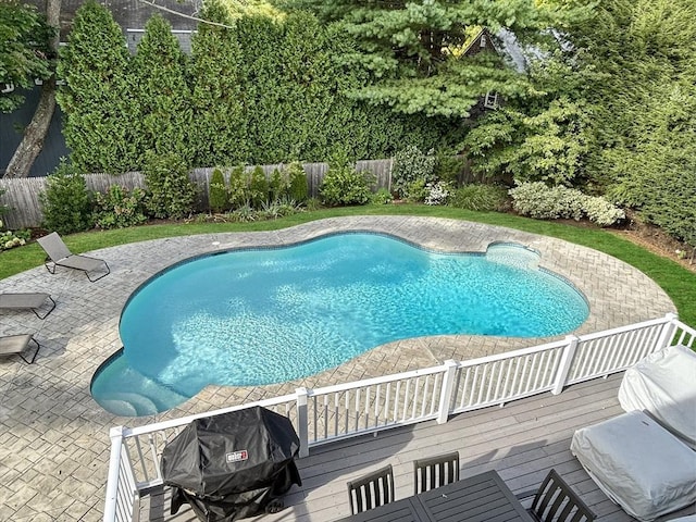 32 Twitchell St, Wellesley, MA 02482 - view of pool featuring a fenced backyard, a wooden deck, and a patio area