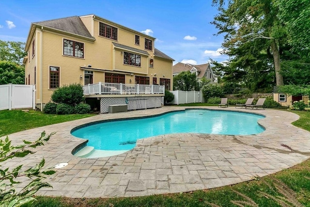 32 Twitchell St, Wellesley, MA 02482 - view of swimming pool with a patio, a fenced backyard, and a wooden deck