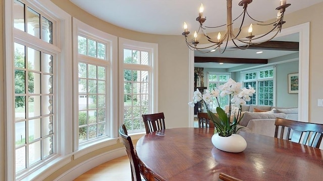 32 Twitchell St, Wellesley, MA 02482 - dining room with a chandelier, plenty of natural light, and light wood-style flooring