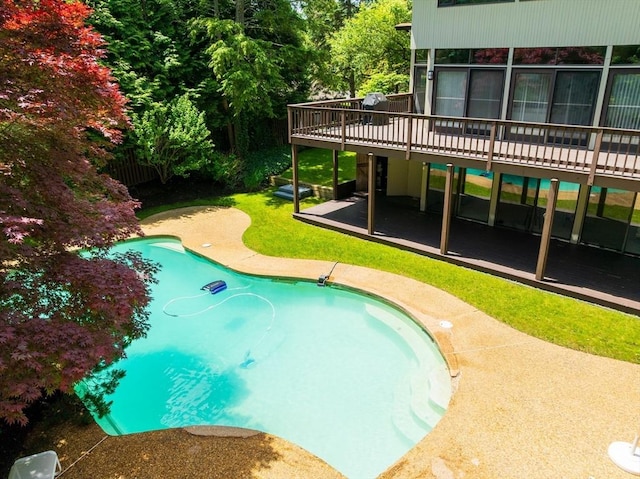 12 Laurus Ln, Newton, MA 02459 - outdoor pool with a wooden deck, a patio area, and area for grilling